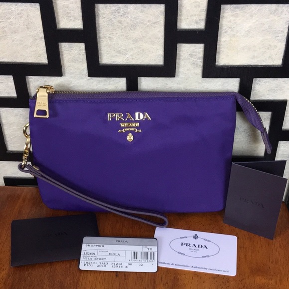 Prada Handbags - RARE Prada Vela Sport Viola multi-pocket clutch